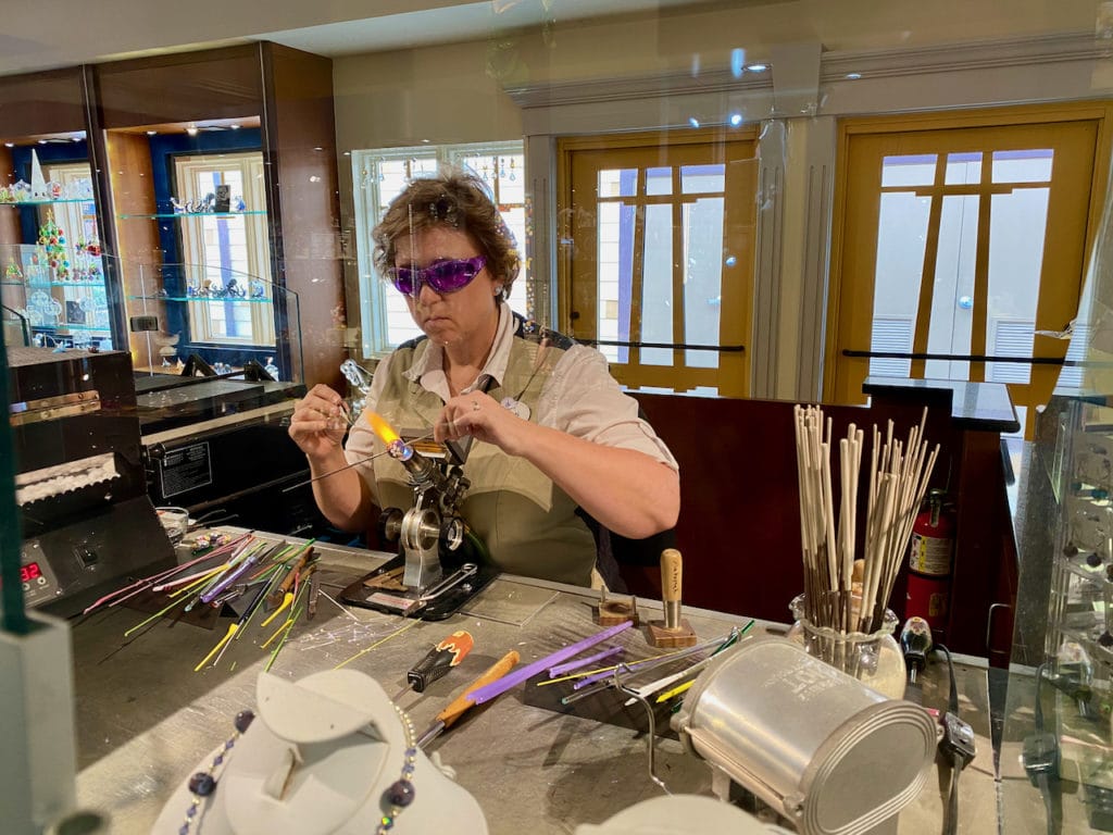 Glass Artist blowing glass at Arribas Brothers in Disney Springs